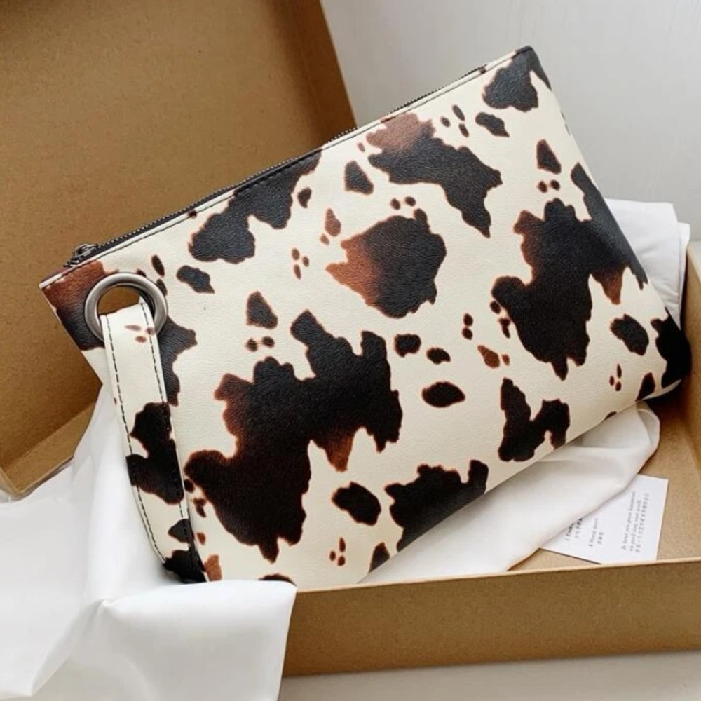 Cow print clutch bag
